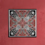 Gerahmter Druck von Kaleidoscope Skulls 1 von Michael Quarz auf einer roten Wand